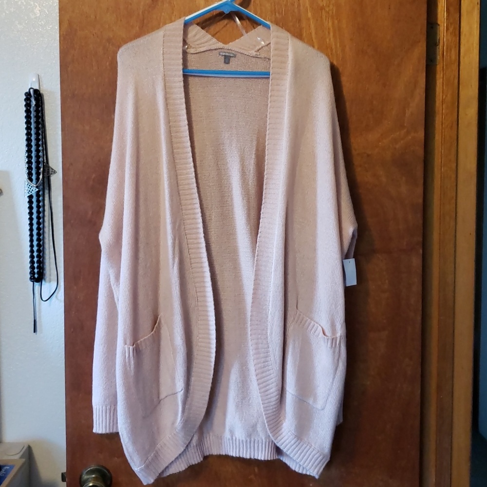 Long, pale pink cardigan